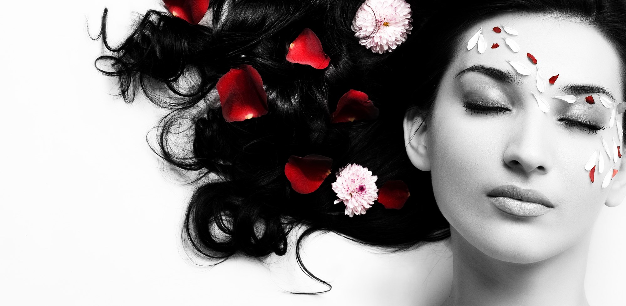 Woman with flowers on her face